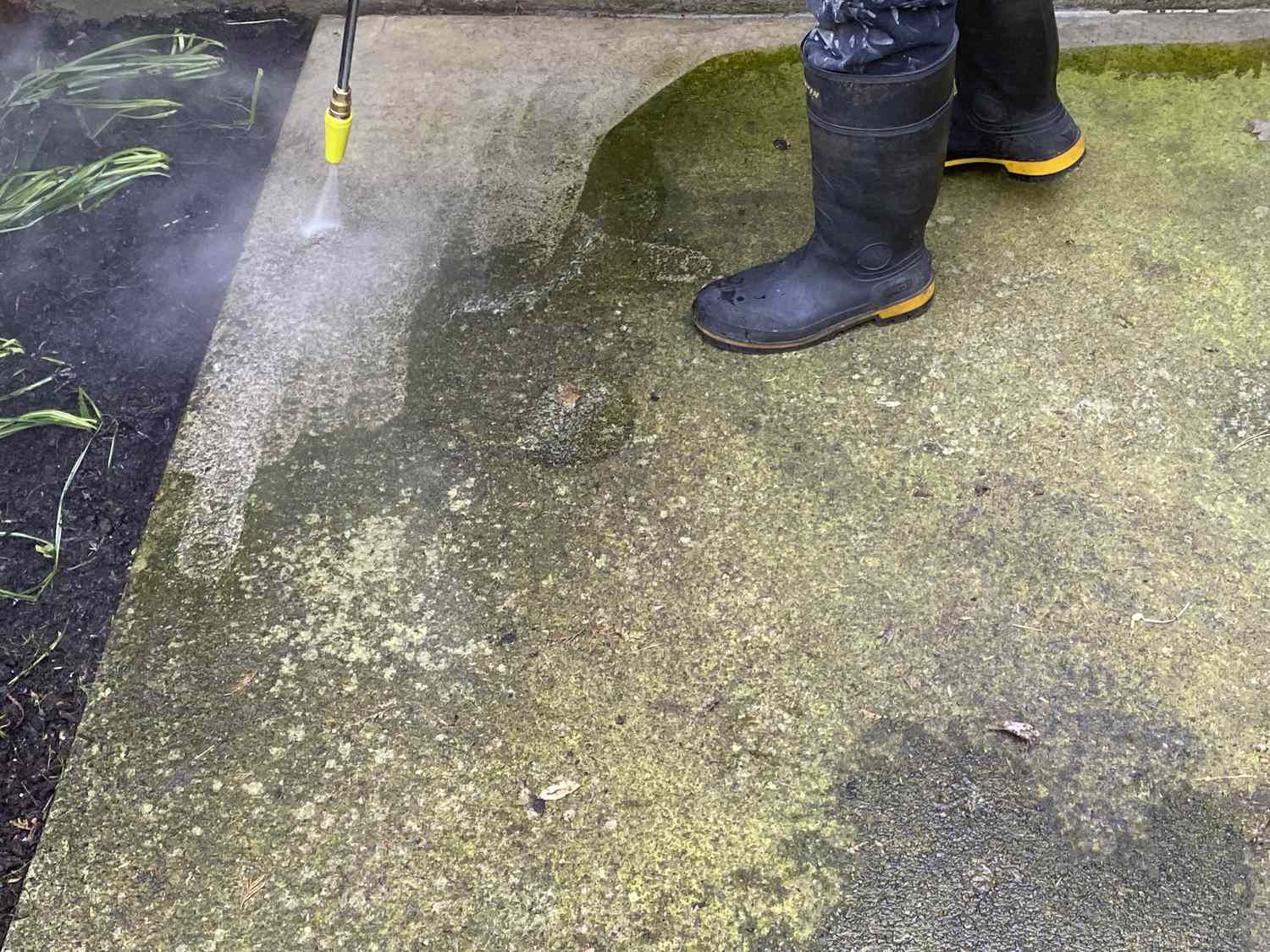Soft Wash Co. cleaning a driveway in Contra Costa County